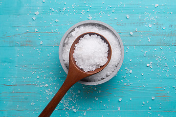 Image showing sea salt in stone bowl and wooden spoon