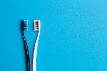 Image showing Photo of black , pink toothbrush