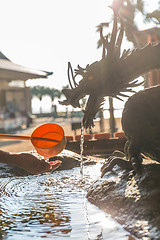 Image showing Washing hand in Japan temple ladles