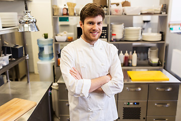 Image showing happy male chef cook at restaurant kitchen