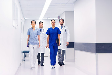 Image showing group of medics or doctors at hospital corridor