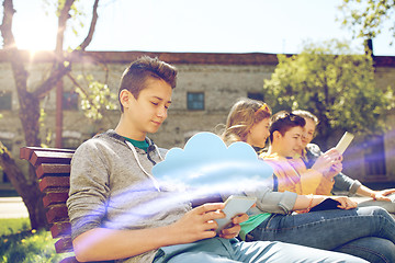 Image showing happy friends with tablet pc computer outdoors