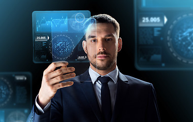 Image showing businessman with tablet pc and virtual screens