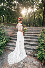 Image showing Wedding decoration in the style of boho, floral arrangement, decorated table in the garden.