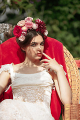 Image showing Wedding decoration in the style of boho, floral arrangement, decorated table in the garden.