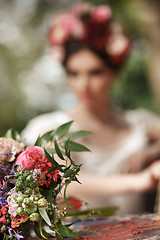 Image showing Wedding decoration in the style of boho, floral arrangement, decorated table in the garden.