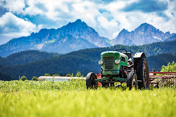 Image showing Old tractor in the Alpine meadows