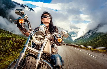 Image showing Biker girl on a motorcycle