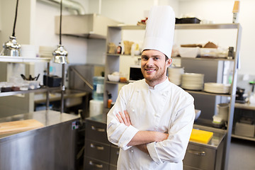 Image showing happy male chef cook at restaurant kitchen