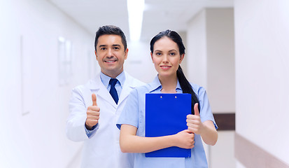 Image showing doctor and nurse showing thumbs up at hospital