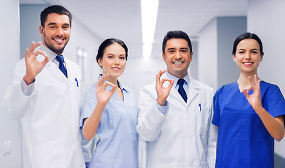 Image showing group of medics at hospital showing ok hand sign