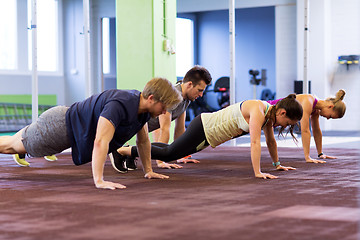 Image showing group of people exercising in gym