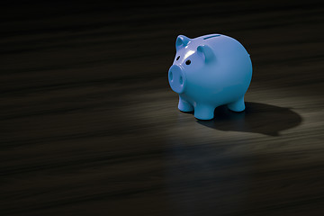 Image showing a blue piggy bank with space for your content