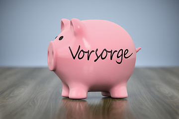 Image showing piggy bank with the word precaution in german language