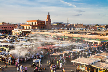 Image showing Jamaa el Fna market square in sunset, Marrakesh, Morocco, north Africa.