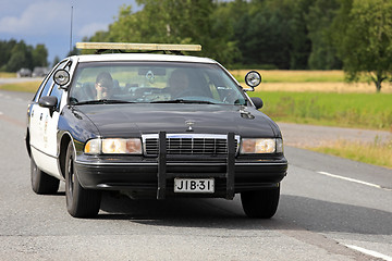 Image showing American Chevrolet Police Car on Highway 