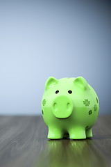 Image showing green clover piggy bank background