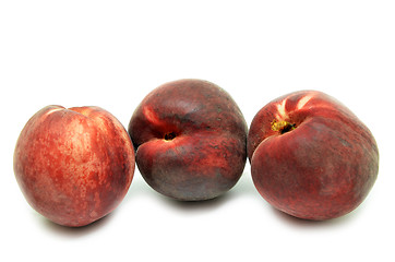 Image showing Three peach isolated