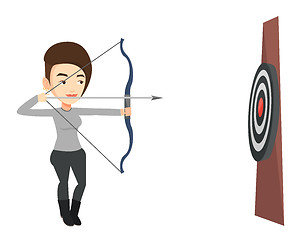 Image showing Archer aiming with bow and arrow at the target.