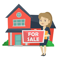 Image showing Young female realtor offering house.