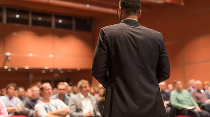 Image showing Public speaker giving talk at Business Event.