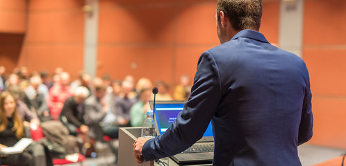 Image showing Public speaker giving talk at Business Event.