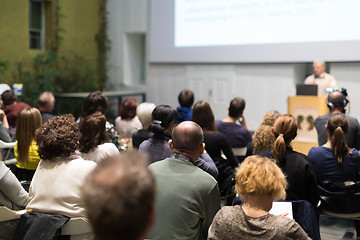 Image showing Man giving presentation in lecture hall at university.