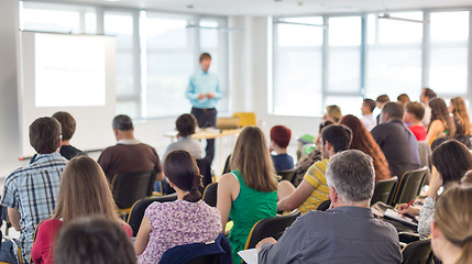 Image showing Speaker giving presentation on business conference.