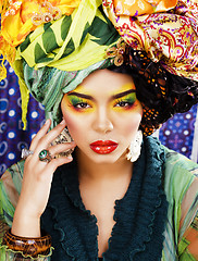 Image showing beauty bright woman with creative make up, many shawls on head l