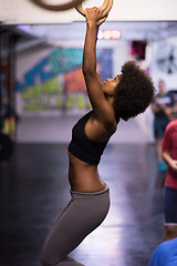 Image showing black woman doing dipping exercise