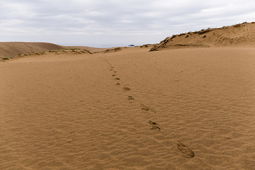 Image showing Foot step on sand