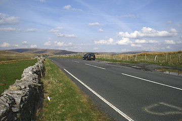 Image showing country road with car