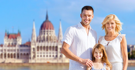 Image showing happy family over house of parliament in budapest