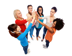 Image showing international group of happy women doing high five