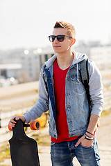 Image showing happy young man or teenage boy with longboard