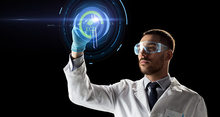 Image showing scientist with test tube and virtual projection