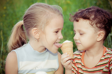 Image showing Two happy children  playing in the park at the day time.