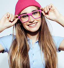 Image showing young pretty blond teenage girl emotional posing, happy smiling isolated on white background, lifestyle people concept