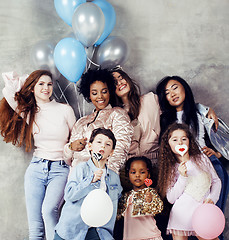 Image showing Lifestyle and people concept: young pretty diversity nations woman with different age children celebrating on birth day party together happy smiling, making selfie. African-american, asian and caucasi