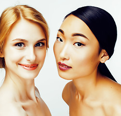 Image showing different nation woman: asian, african-american, caucasian together isolated on white background happy smiling, diverse type on skin, lifestyle people concept