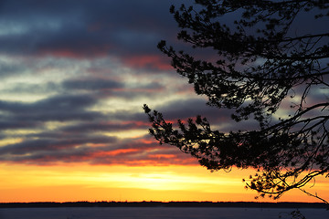 Image showing sunset in winter over the lake
