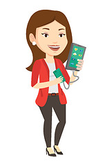 Image showing Woman reharging smartphone from portable battery.