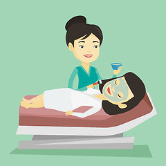 Image showing Woman in beauty salon during cosmetology procedure