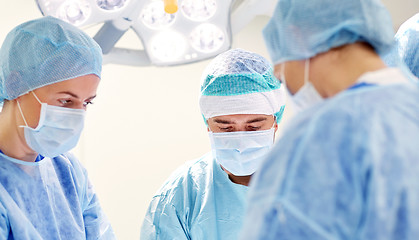 Image showing group of surgeons in operating room at hospital