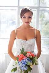 Image showing Beautiful bride in wedding dress, white background