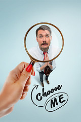 Image showing Closeup portrait of smiling, happy, surprised, young business man, on blue background.