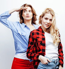 Image showing best friends teenage girls together having fun, posing emotional on white background, besties happy smiling, lifestyle people concept close up