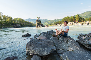 Image showing at riverbank of mountain river