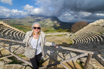 Image showing Tourist taking photo in front of greek theater of Segesta, Sicily, Italy