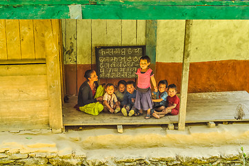 Image showing Teacher with children in Nepal